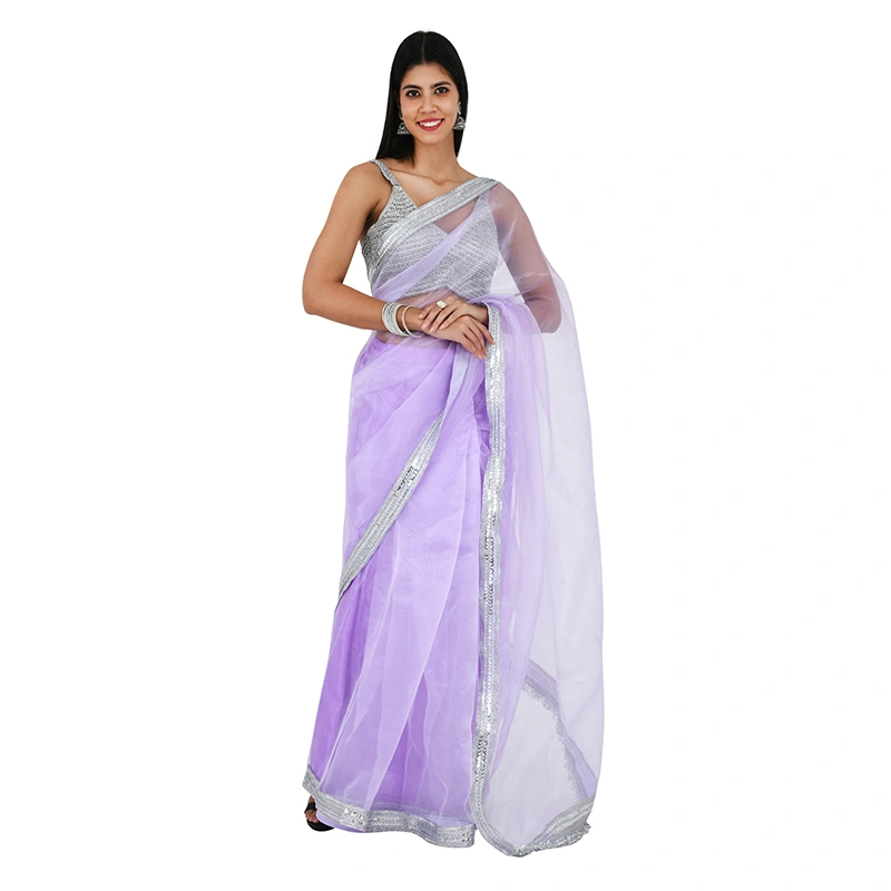 Female model in lavender ombre organza saree with silver sequin border - ethnic wear ecommerce photography by Lohar Studio Delhi